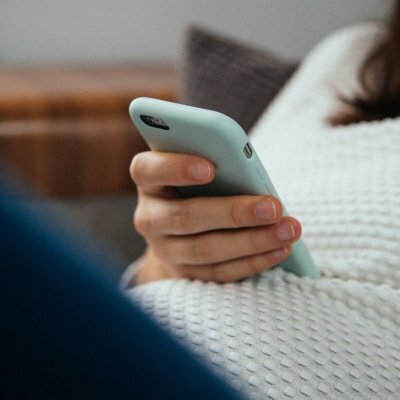 woman holding phone